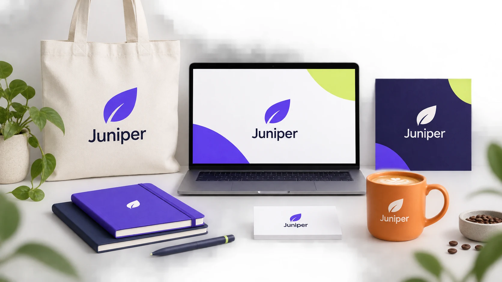 Conceptual Juniper brand kit with coordinated stationery, tote bag, laptop, and social graphics